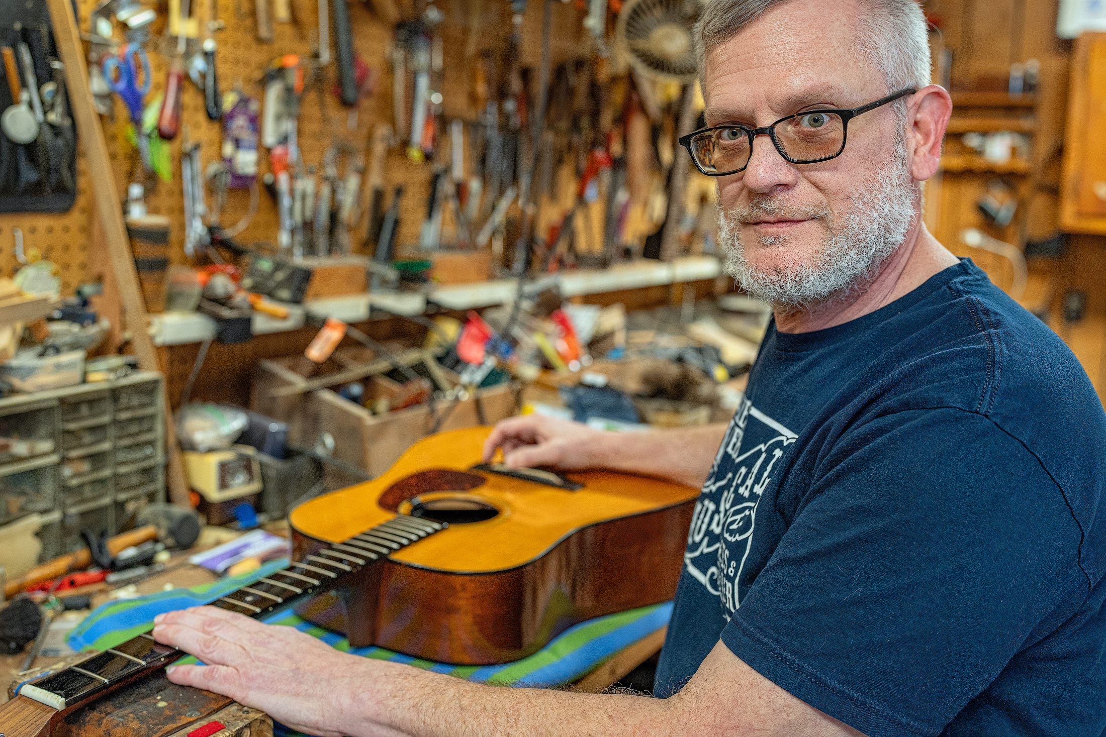 James Webb working on guitar repair